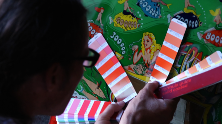 Wade Krause works on an Antique Pinball GamePhoto Credit: Don Starnes Courtesy Anna Newman Group